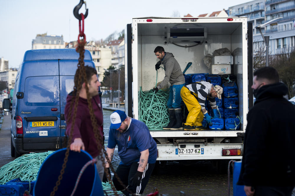 Crew from the fishing boat <em>L'Ophelea</em> unload equipment in Boulogne-sur-Mer. Brexit supporters have equated fishing rights with British sovereignty and claimed Europeans were 
