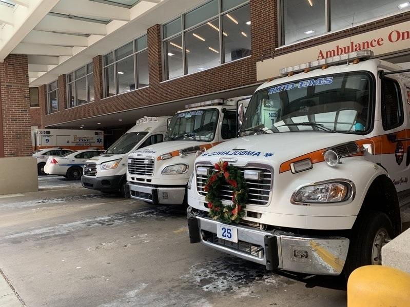 Ambulances fill the loading area at Vanderbilt University Medical Center in Nashville. The hospital has tried to adjust to the surge of new infections by dedicating three floors for treatment of COVID-19 patients, and creating two COVID-only intensive care units for the most seriously ill. Still, the hospital has had to deny patient-transfer requests from smaller hospitals.