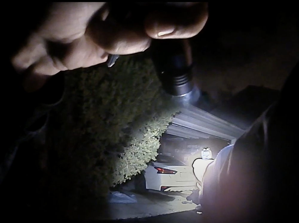 This image from a Columbus police body camera shows the moments before Officer Adam Coy fatally shoots Andre Maurice Hill early Tuesday.