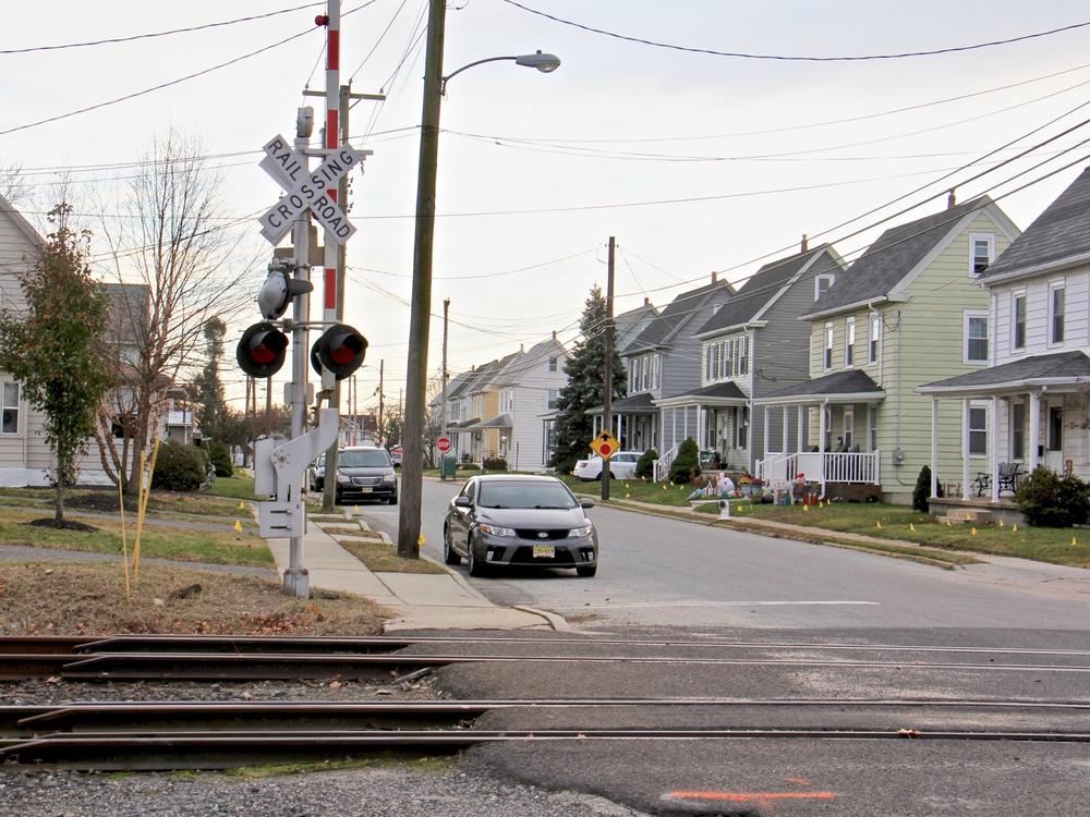 Homes next to train tracks in Gibbstown, NJ, where up to 200 rail cars a day will be allowed to carry liquefied natural gas to an export terminal.