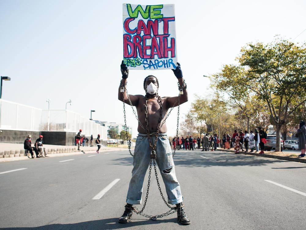 Members of Economic Freedom Fighters (EFF) protest against the death of George Floyd outside U.S. Consulate in solidarity with Black Lives Matter movement on June 8, 2020 in Sandton, South Africa.