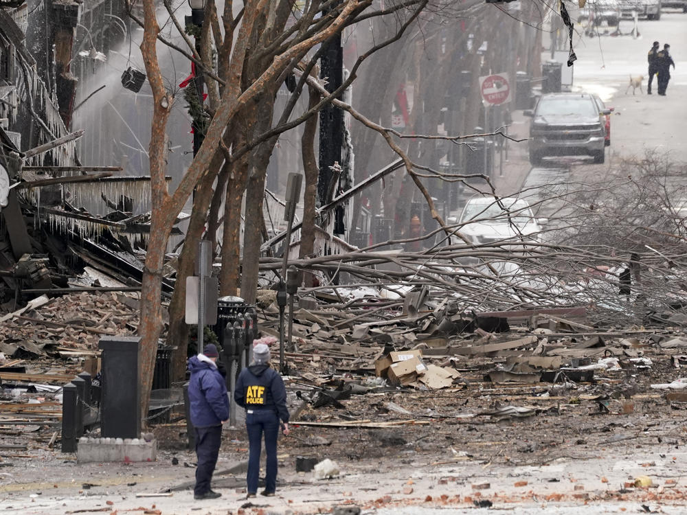 Emergency personnel work near the scene of an explosion in downtown Nashville, Tenn., on Dec. 25.
