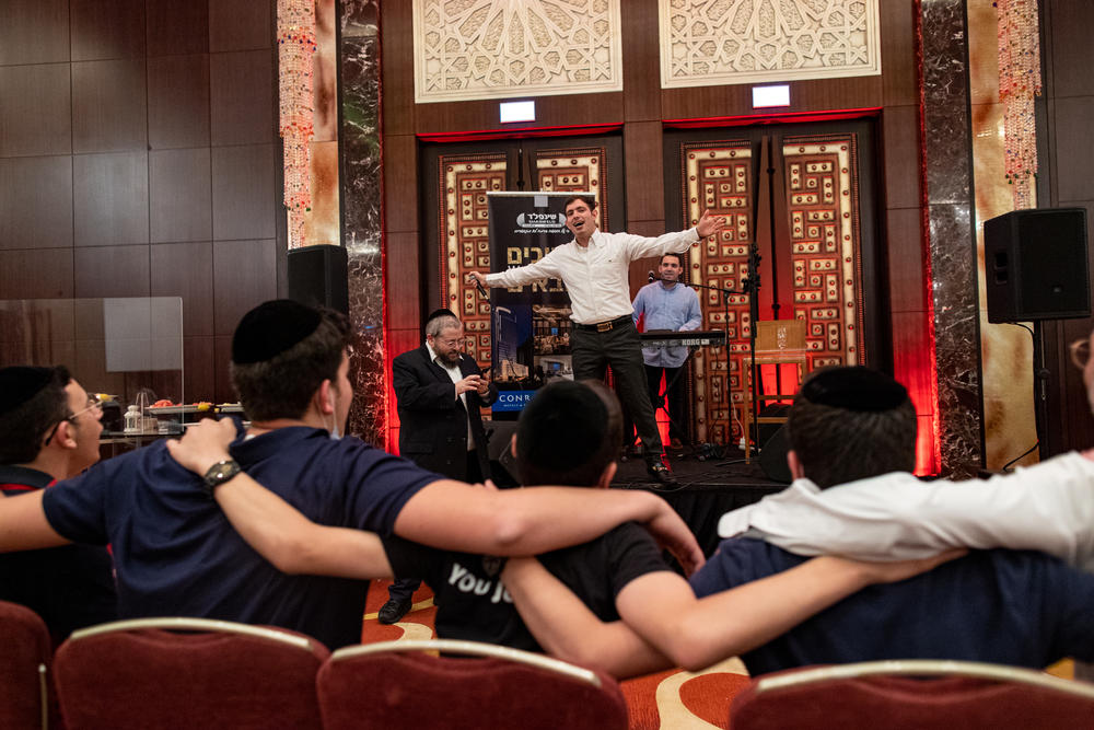 An Israeli ultra-Orthodox singer, Ruli Dikman, entertains Israeli tourists during a Hanukkah celebration at the Conrad Hotel in Dubai on Dec. 16.