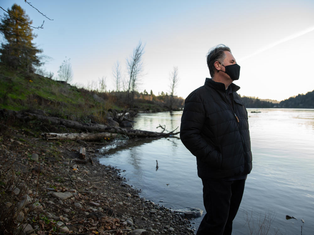 Joel McLemore of Milwaukie, Ore., looks at the Willamette River near his home in suburban Portland, Ore. McLemore moved to Oregon in April to pursue new employment opportunities after his divorce.