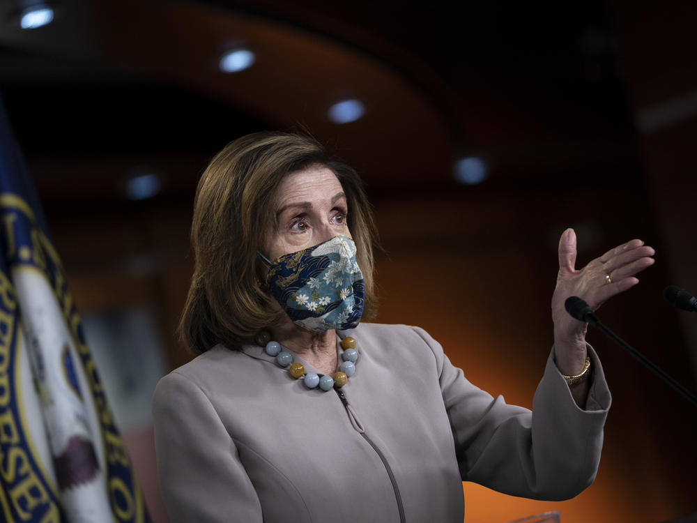 House Speaker Nancy Pelosi, pictured on Dec. 10, led her chamber in a vote to override President Trump's veto of the annual defense bill on Monday.