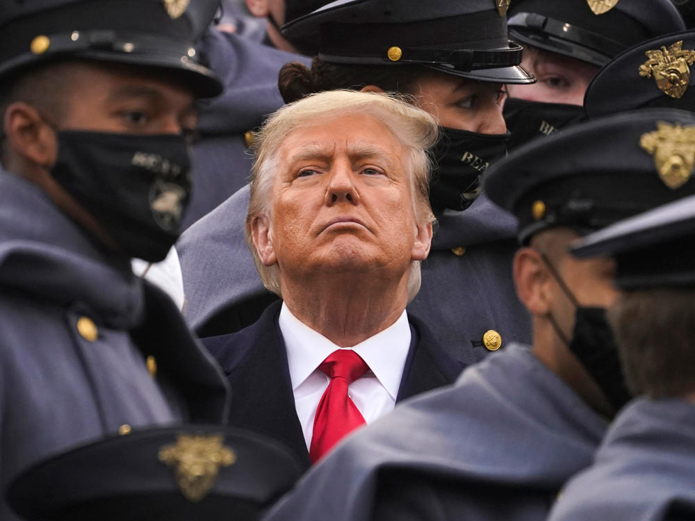 Surrounded by Army cadets, President Trump watches the Army-Navy football game at the U.S. Military Academy in West Point, N.Y., on Dec. 12.