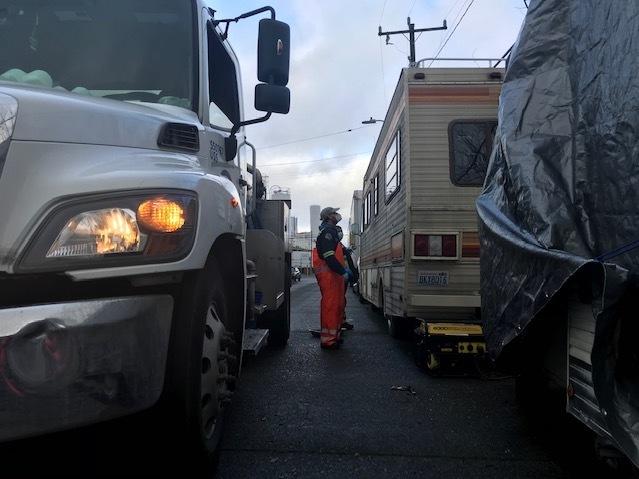 As RV Wastewater Pilot Program coordinator for Seattle Public Utilities, Chris Wilkerson visits people living in motor homes and trailers and offers to pump out their waste for free.