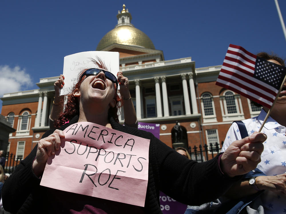 Women's rights activists, including Jane Marcus of Medford, pictured in May, have been urging the legislature to pass a law that codifies abortion rights in state law.