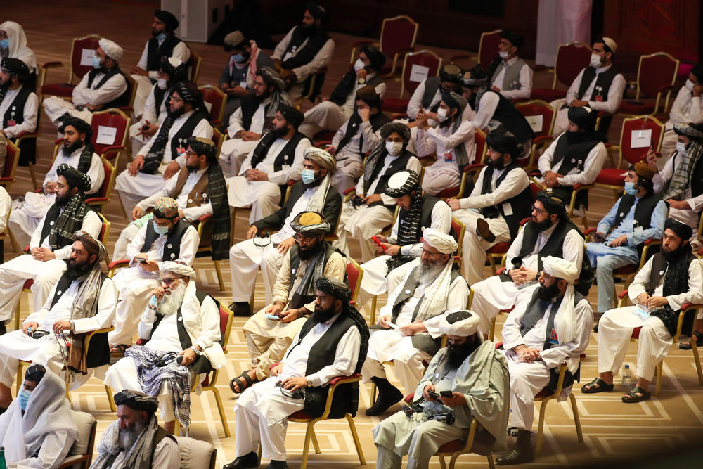 Following a U.S.-Taliban agreement in February, a Taliban delegation attends the opening session of peace talks with Afghan government representatives in Doha, Qatar, on Sept. 12.