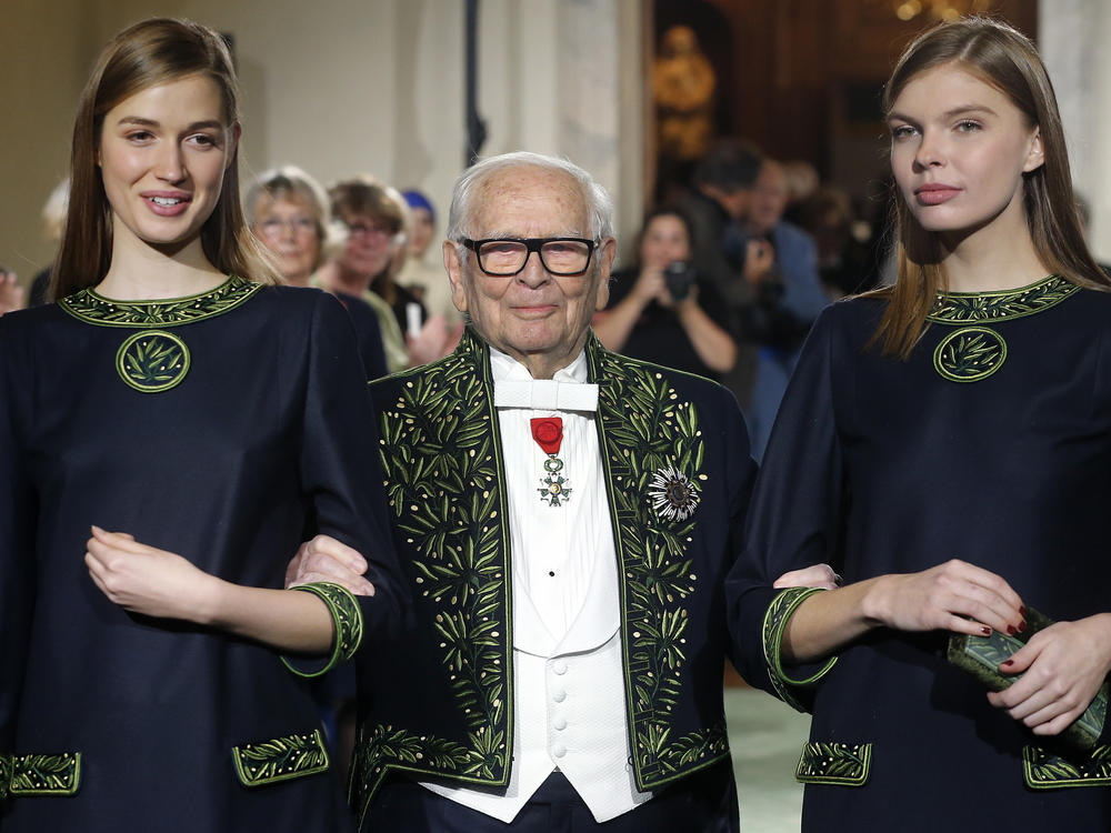 French designer Pierre Cardin has died at age 98. Here, the member of the Académie des Beaux-Arts is seen in 2016, at the end of a fashion show marking 70 years of his creations at the Institut de France in Paris.