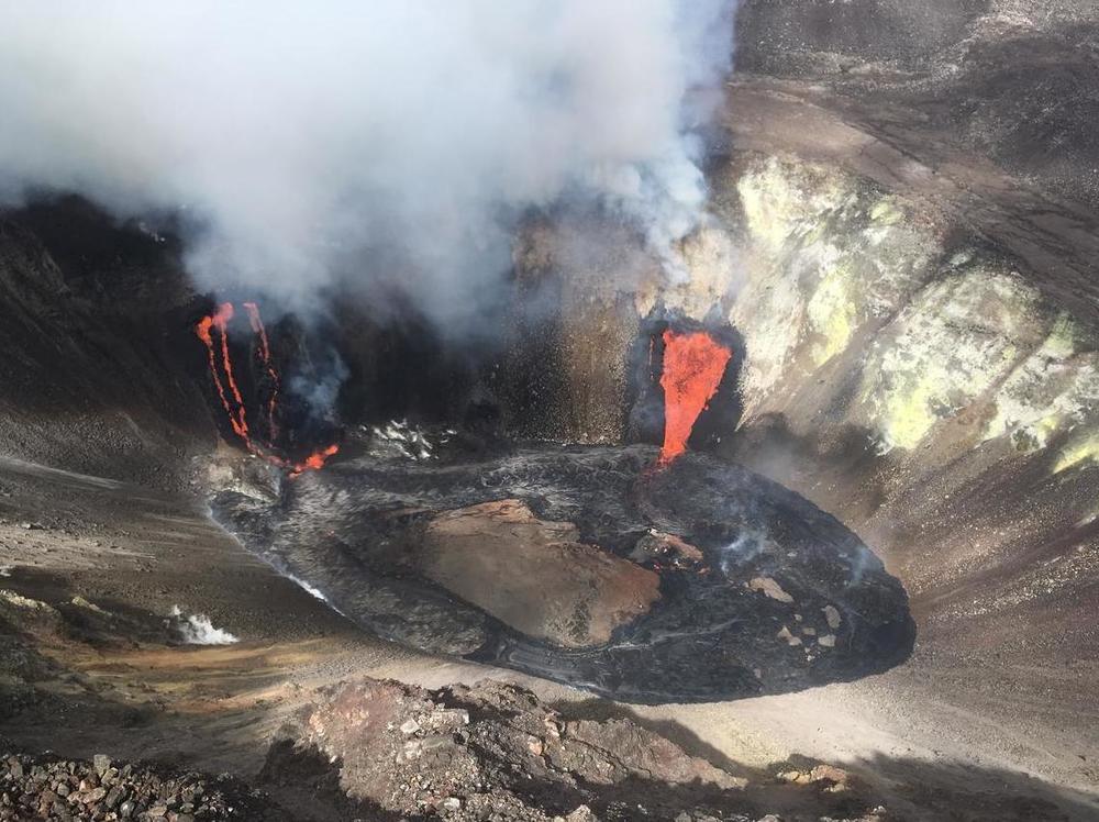 An aerial view of the Kilauea summit shows the eruption from a Hawaiian Volcano Observatory overflight at approximately 11:20 a.m. on Dec. 21. The two active fissure locations continue to feed lava into the growing lava lake.