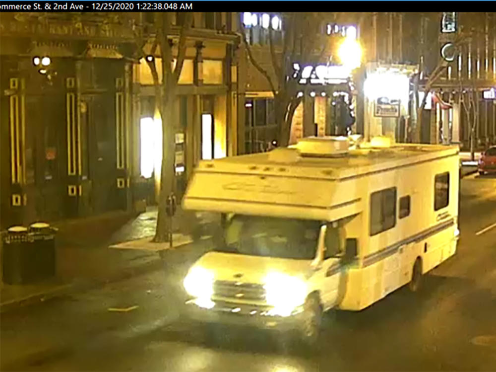 A screengrab of surveillance footage shows the recreational vehicle used in the Christmas day bombing in Nashville, Tennessee. The girlfriend of the man who carried out the attack says she warned police in August of last year that he was making bombs in his RV.