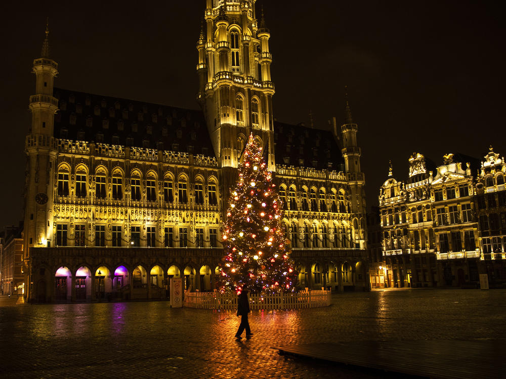 The Grand Place in downtown Brussels stands nearly deserted as residents remain under curfew.