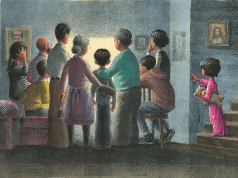 In Matt de la Peña's <em></em><em>Love, </em>a child comes downstairs to find the whole family gathered around the television. 