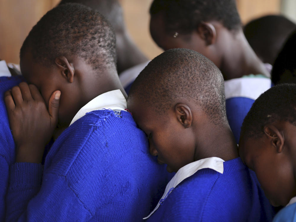 Students rehearse a poem that they will recite at an event advocating against female genital mutilation at the Imbirikani Girls High School in Kenya.