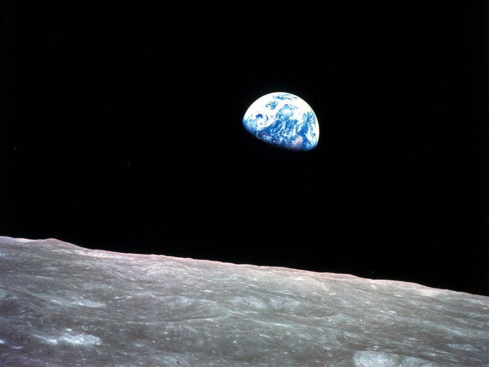 This Dec. 24, 1968, photo made available by NASA shows the Earth behind the surface of the moon during the Apollo 8 mission.