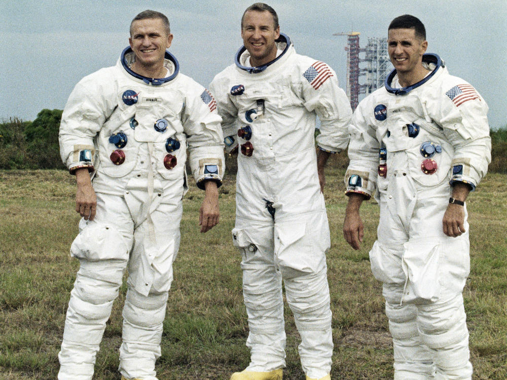 Frank Borman (L), commander of 3-man Apollo 8 crew, along with Jim Lovell (C) and Bill Anders (R), on Dec. 21, 1968. They became the first people to circle the moon on Christmas Eve.