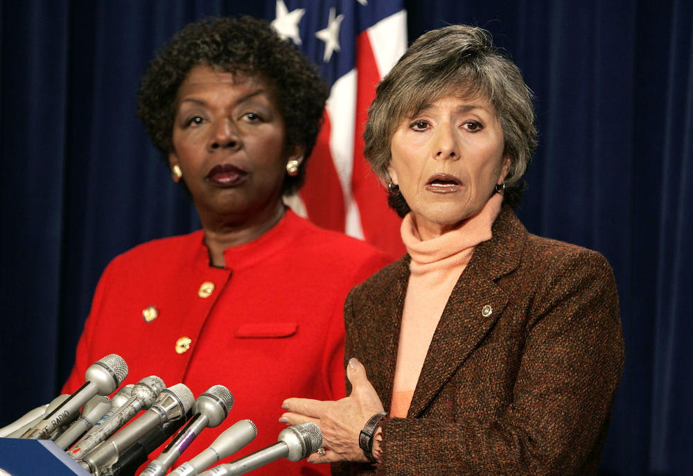 Sen. Barbara Boxer, D-Calif., speaks as Rep. Stephanie Tubbs Jones, D-Ohio, listens during a news conference to announce their objection to the certification of Ohio's electoral votes in January 2005.