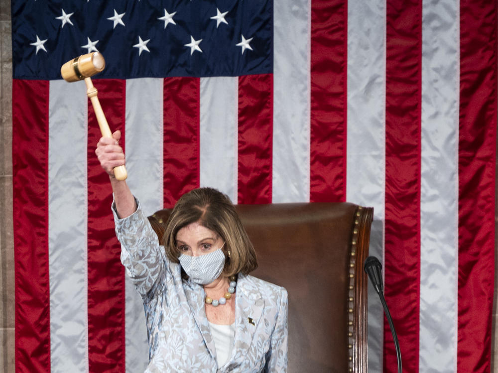 House Speaker Nancy Pelosi, D-Calif., waves the gavel on the opening day of the 117th Congress on Capitol Hill on Jan. 3. She will preside Wednesday over any House debate and possible Republican objections to electoral vote counts.