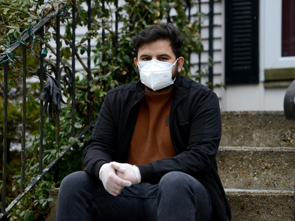 Carlos Reyes, a certified nursing assistant in Massachusetts, says the nursing homes where he works told him he could not get vaccinated because he is a contract worker. He has since tested positive for the coronavirus.