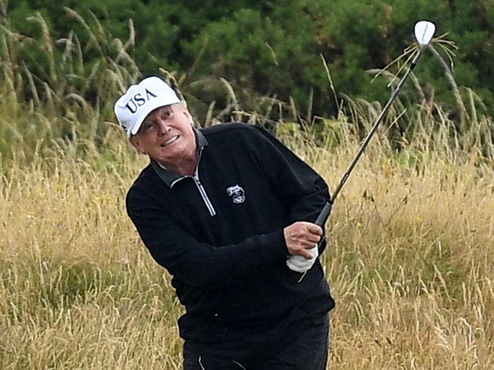 Uncertainty about President Trump's plans for the upcoming inauguration has sparked speculation over whether he might travel to Scotland rather than attend the ceremony. Here he plays at his Turnberry golf resort in 2018.
