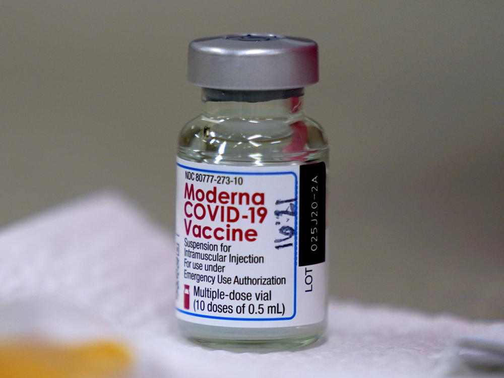 A bottle of Moderna's COVID-19 vaccine is shown before being used last month in Topeka, Kan. The European Medicines Agency has recommended authorizing the drug on a conditional basis.