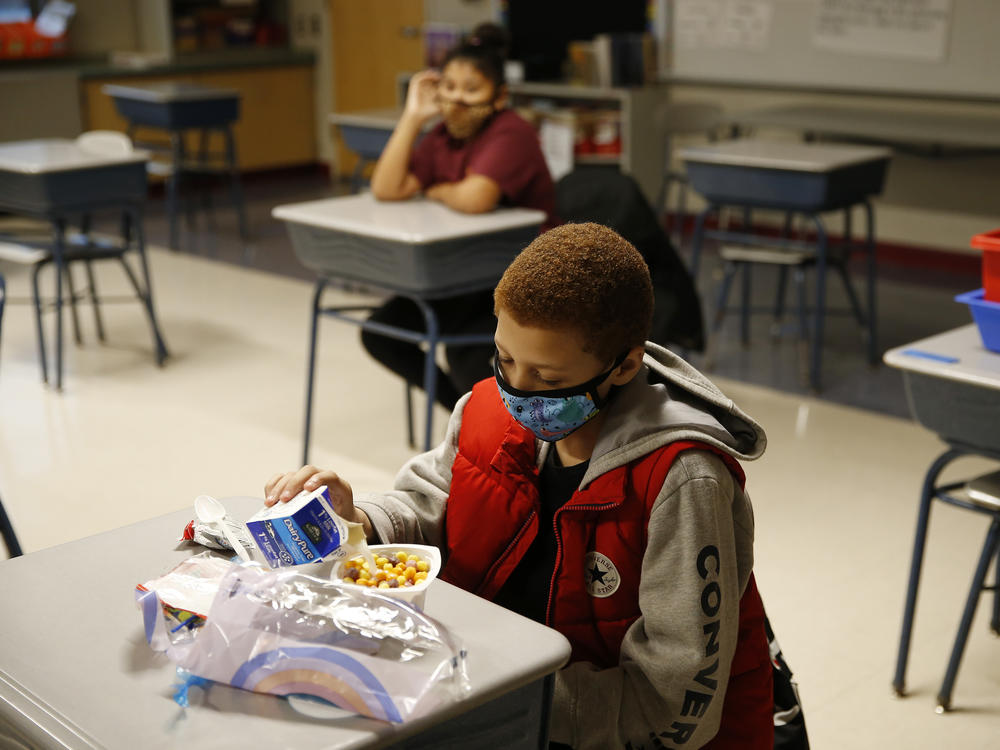 A fourth-grader eats breakfast at Mary L. Fonseca Elementary School in Fall River, Mass.