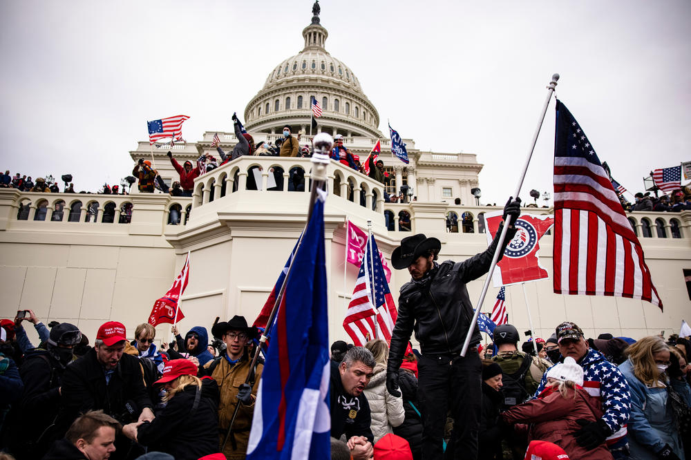 Pro-Trump extremists storm the U.S. Capitol following a rally with President Trump on Wednesday.
