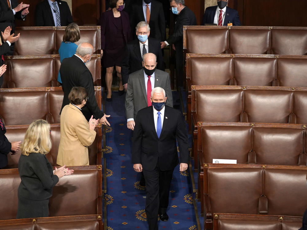 Vice President Pence arrives Wednesday at the joint session of Congress to ratify President-elect Joe Biden's election win.