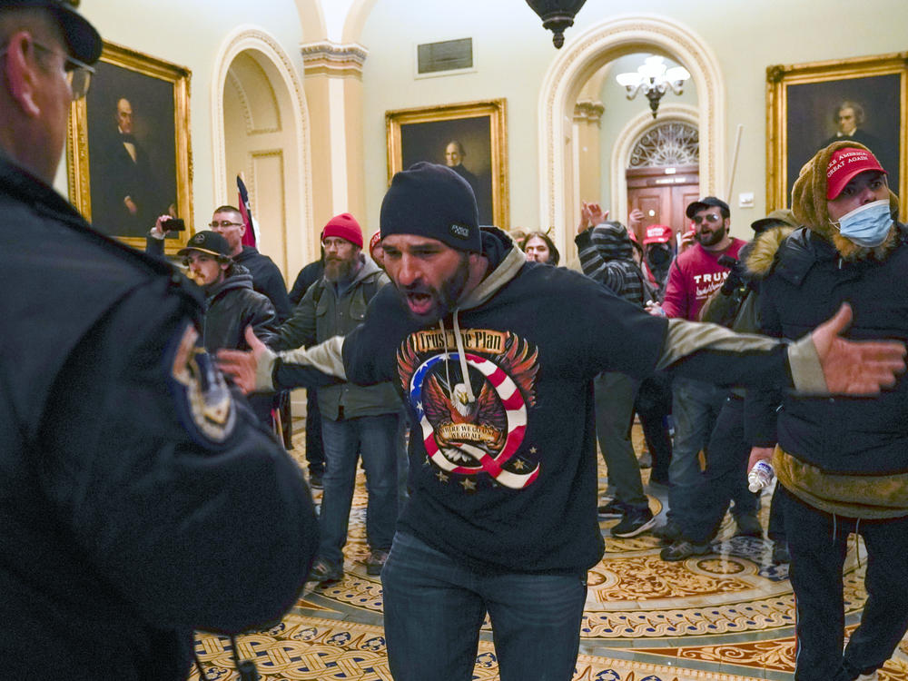 Pro-Trump extremists outside the U.S. Senate chamber Wednesday after forcing their way inside the Capitol.