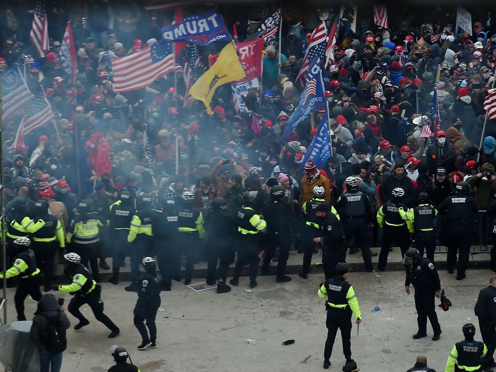 Police hold back supporters of Donald Trump as they gather outside the U.S. Capitol on January 6, 2021, in Washington, DC.