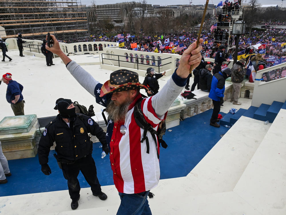 Trump supporters clash with police and security forces as they invade the U.S. Capitol on Wednesday.