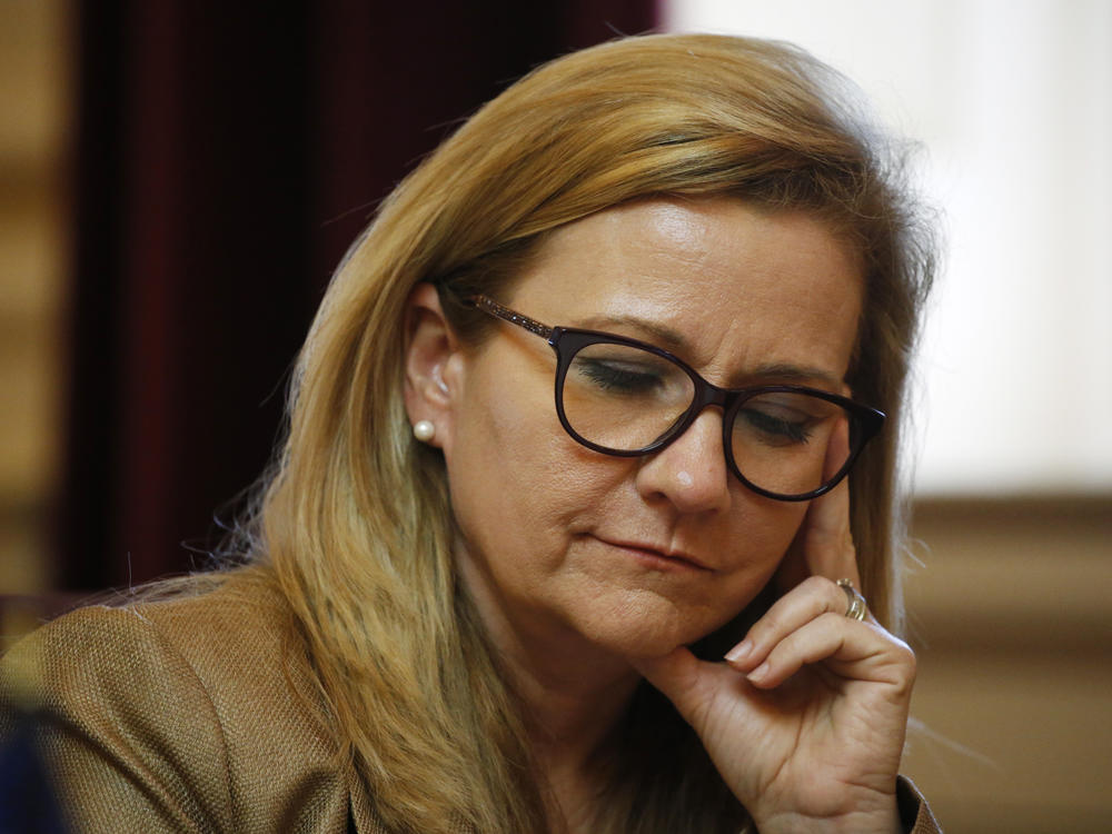 Virginia state Sen. Amanda Chase, a Republican, listens to debate during the Senate session at the Capitol Wednesday, Feb. 26, 2020, in Richmond, Va. Chase attended the rally in Washington, D.C., in which rioters pushed their way into the U.S. Capitol.
