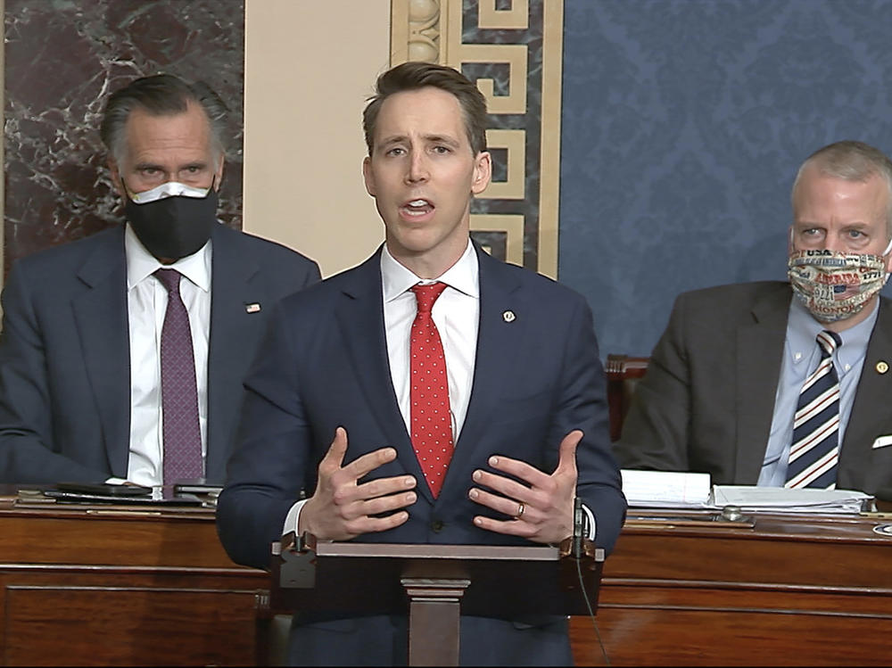 Sen. Josh Hawley, R-Mo., speaks during a Senate debate on whether to confirm the Electoral College vote, after protesters stormed the U.S. Capitol on Wednesday.