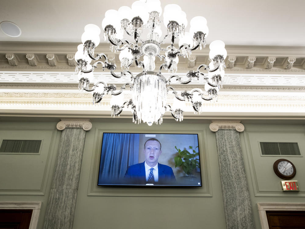 Facebook CEO Mark Zuckerberg is shown testifying at a Senate hearing on Capitol Hill last October. Facebook and Twitter announced new actions to curb the spread of misinformation.