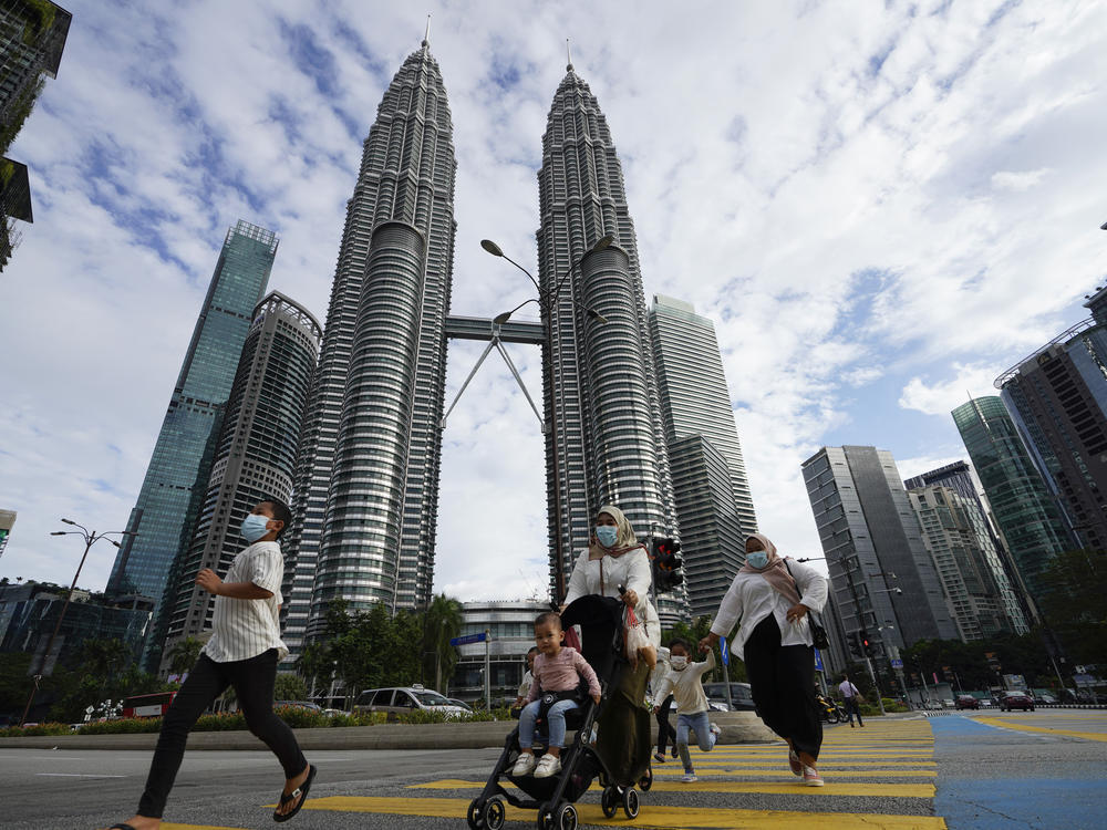 Malaysia's king suspended the national parliament and state legislatures for an unspecified period of time under the nation's new virus restrictions.