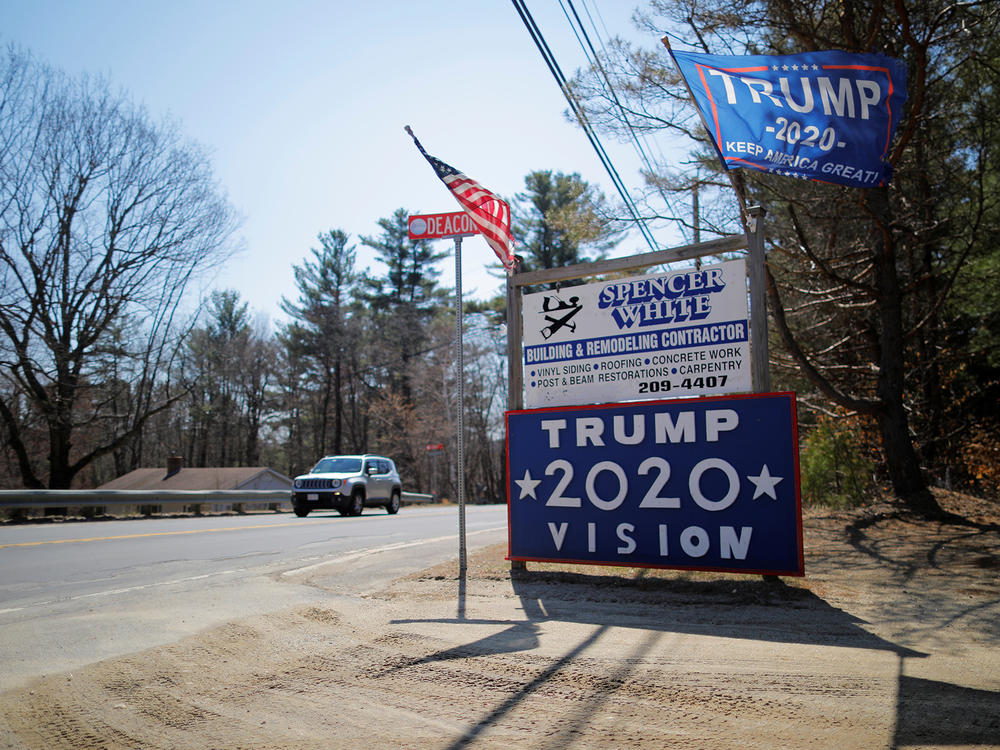 A sign supporting President Trump stands on the roadside last year in Troy, N.H.