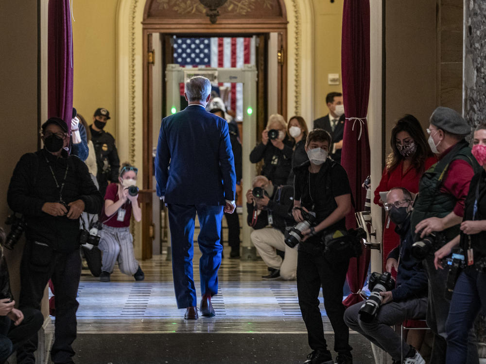 Republican Rep. John Katko, who voted in favor of impeachment, walks back to the House chamber at the U.S. Capitol on Wednesday.