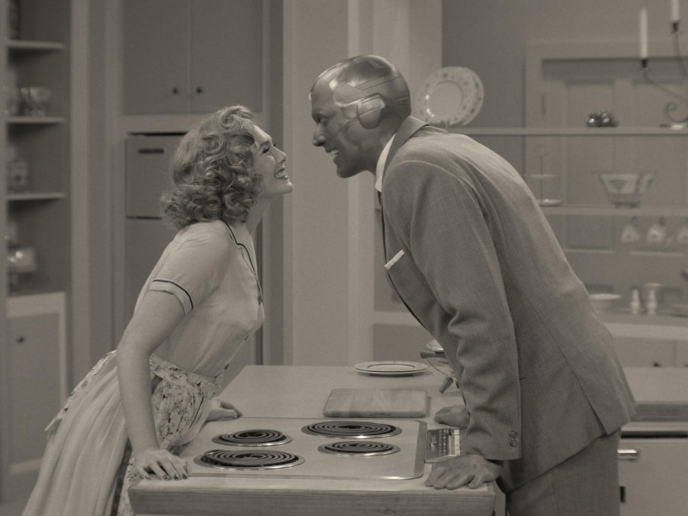 In Disney+'s <em>WandaVision</em>, Wanda (Elizabeth Olsen) and Vision (Paul Bettany) find themselves in a disturbing situation ... comedy.
