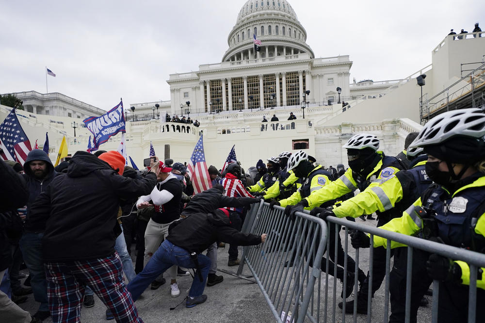 Trump supporters try to break through a police barrier Jan. 6 at the U.S. Capitol in Washington, D.C.