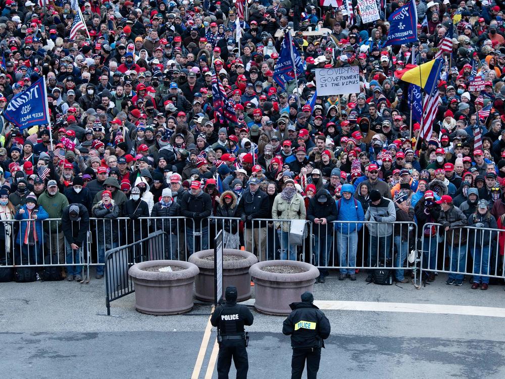Trump supporters gathered on Jan. 6 outside a security perimeter on the National Mall for a rally against the Electoral College certification of Joe Biden as the winner of the 2020 presidential election.