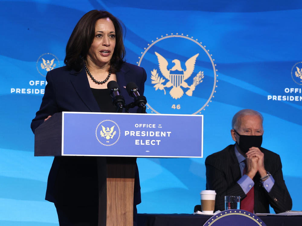 Vice President-elect Kamala Harris delivers remarks on Jan. 8 as President-elect Joe Biden looks on. The two are set to be inaugurated Wednesday at the U.S. Capitol.