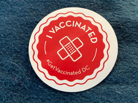 No lollipops at the vaccination center, but they were giving out stickers.