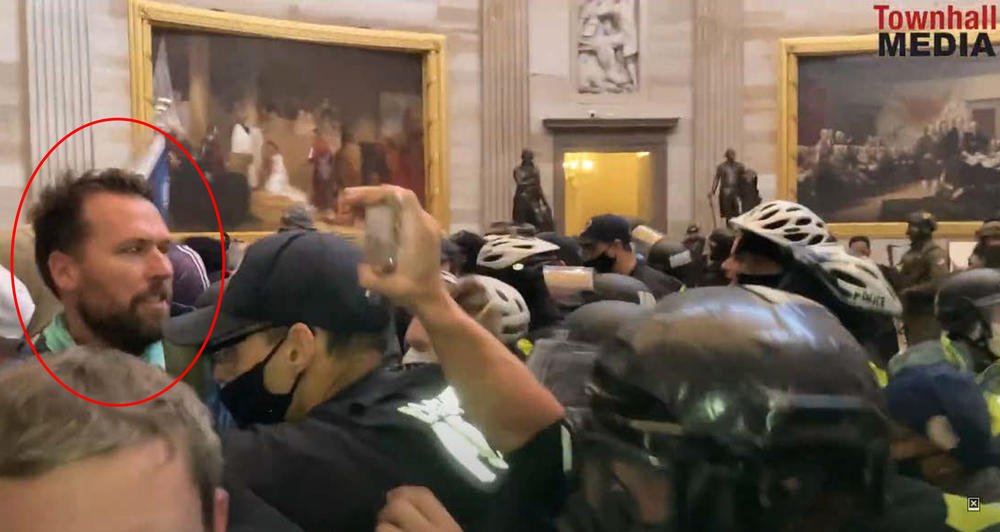 A screenshot allegedly identifies Keller in the Rotunda during the U.S. Capitol insurrection. The FBI identified him in part because he was wearing a blue jacket with 