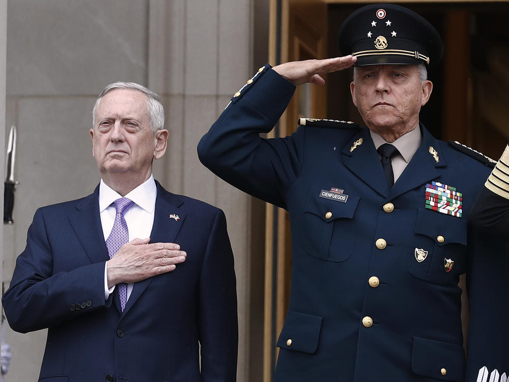 Former Defense Secretary Jim Mattis, left, and former Mexican Defense Secretary Gen. Salvador Cienfuegos Zepeda during an honor cordon at the Pentagon in 2017. Mexico cleared Cienfuegos of all charges related to drug trafficking on Thursday.