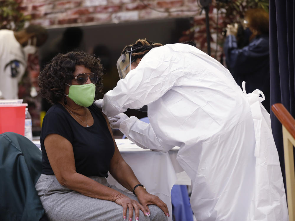 A resident of the Jackson Heights neighborhood in Tampa, Fla., got immunized against COVID-19 at St. Johns Missionary Baptist Church on Jan. 10.