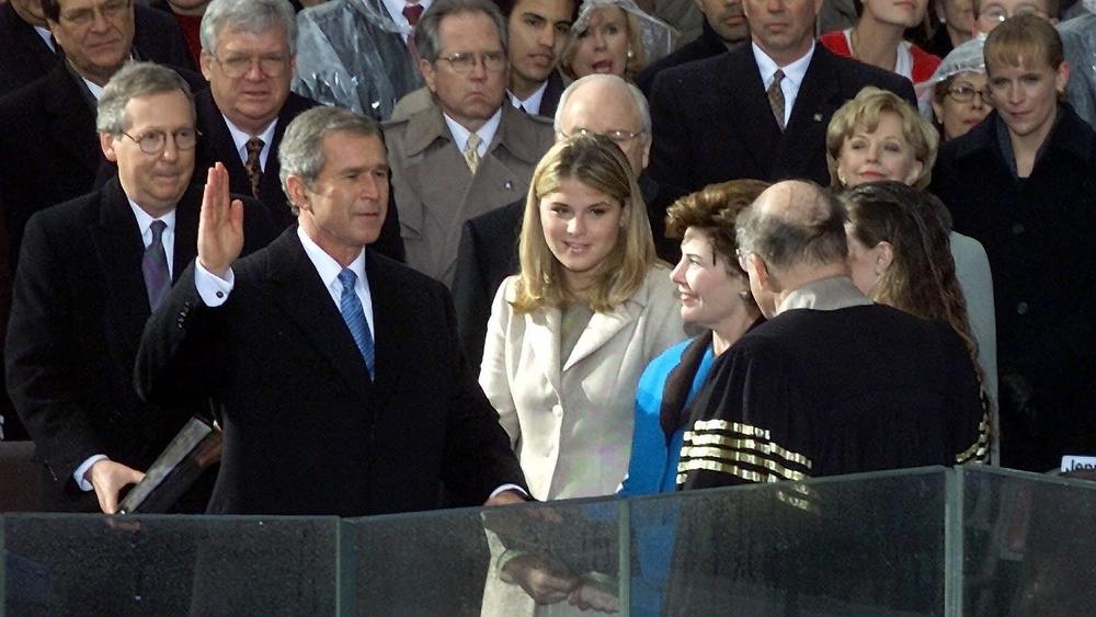 George W. Bush takes the oath of office from Chief Justice William Rehnquist to become the 43rd president on Jan. 20, 2001.