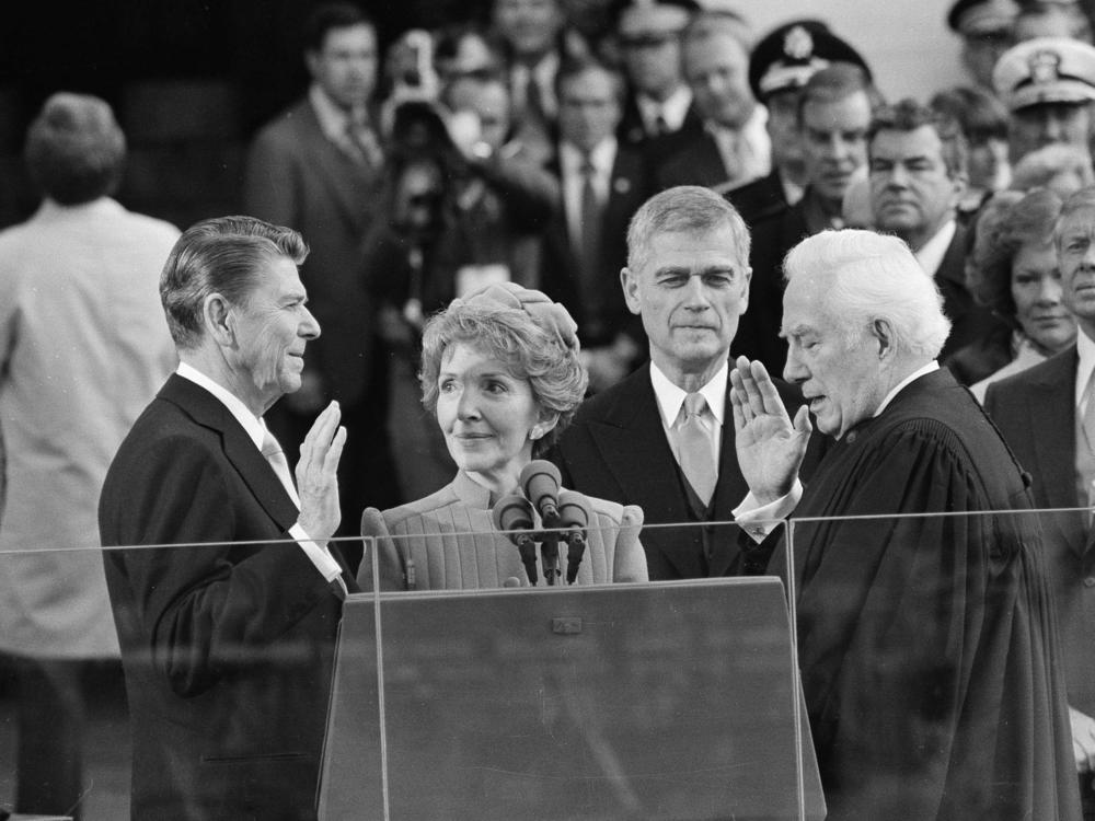 Chief Justice Warren Burger administers the oath of office to Ronald Reagan at the Capitol on Jan. 20, 1981.