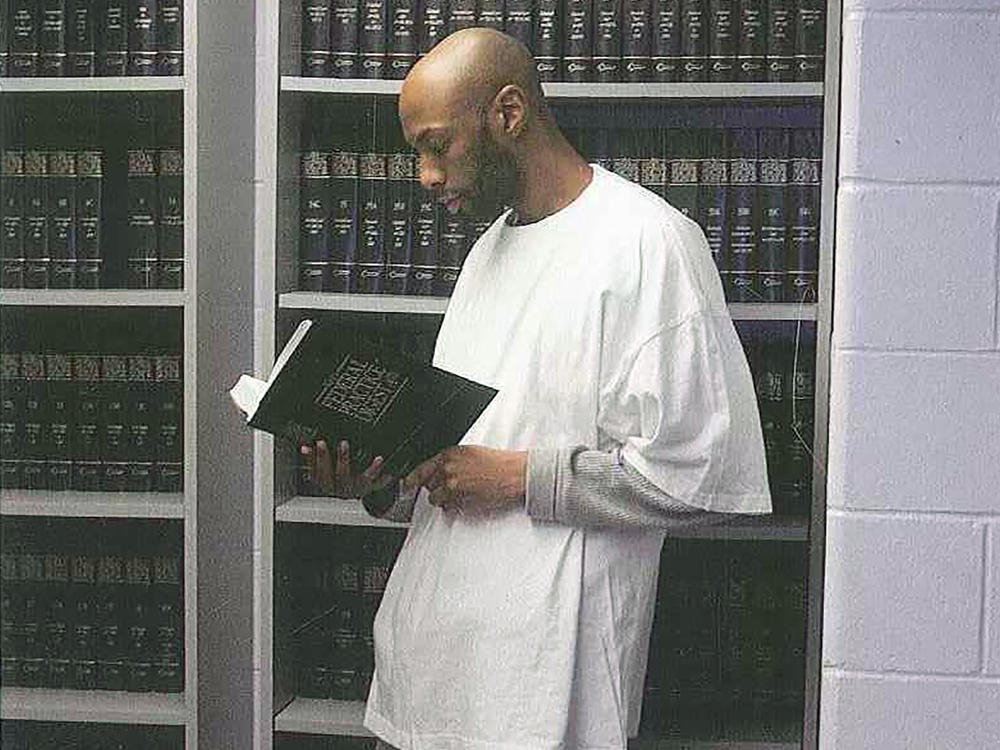 This 2015 photo provided by Shawn Nolan Chief, Capital Habeas Unit Community Federal Defender Office for the Eastern District of Pennsylvania, shows Dustin Higgs at the Federal Prison in Terre Haute, Ind.