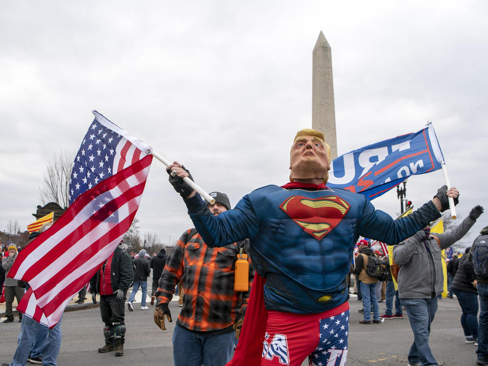 A Trump supporter dressed as the president in a Superman outfit attends the Jan. 6 rally against the election results before rioters stormed the U.S. Capitol.